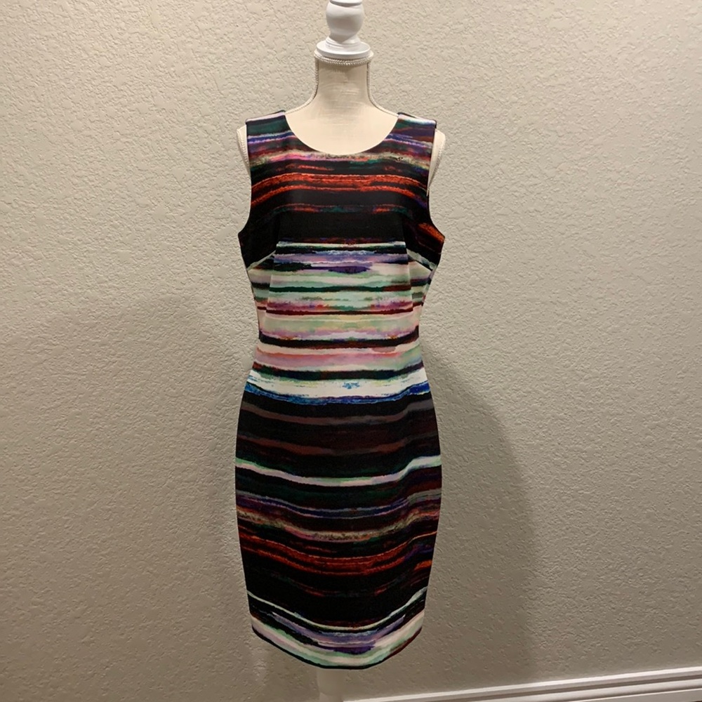 Colorful sheath dress size 12, 95% poly and 5% spandex, 100% black poly lining.